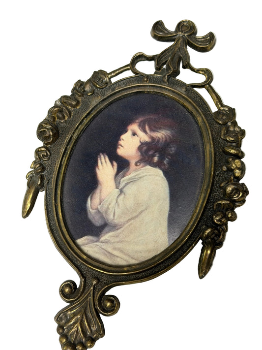 Decorative frame with a portrait of a child on a white background
