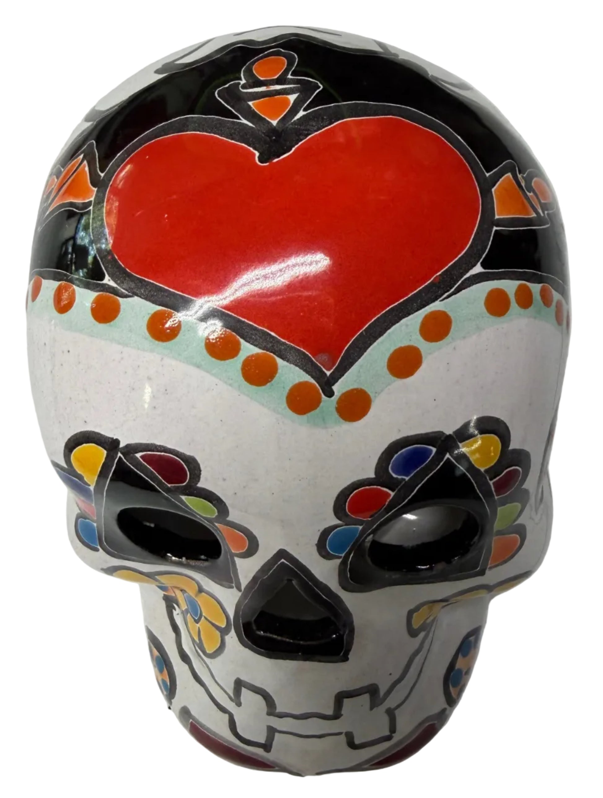 Decorative skull with colorful patterns on a white surface