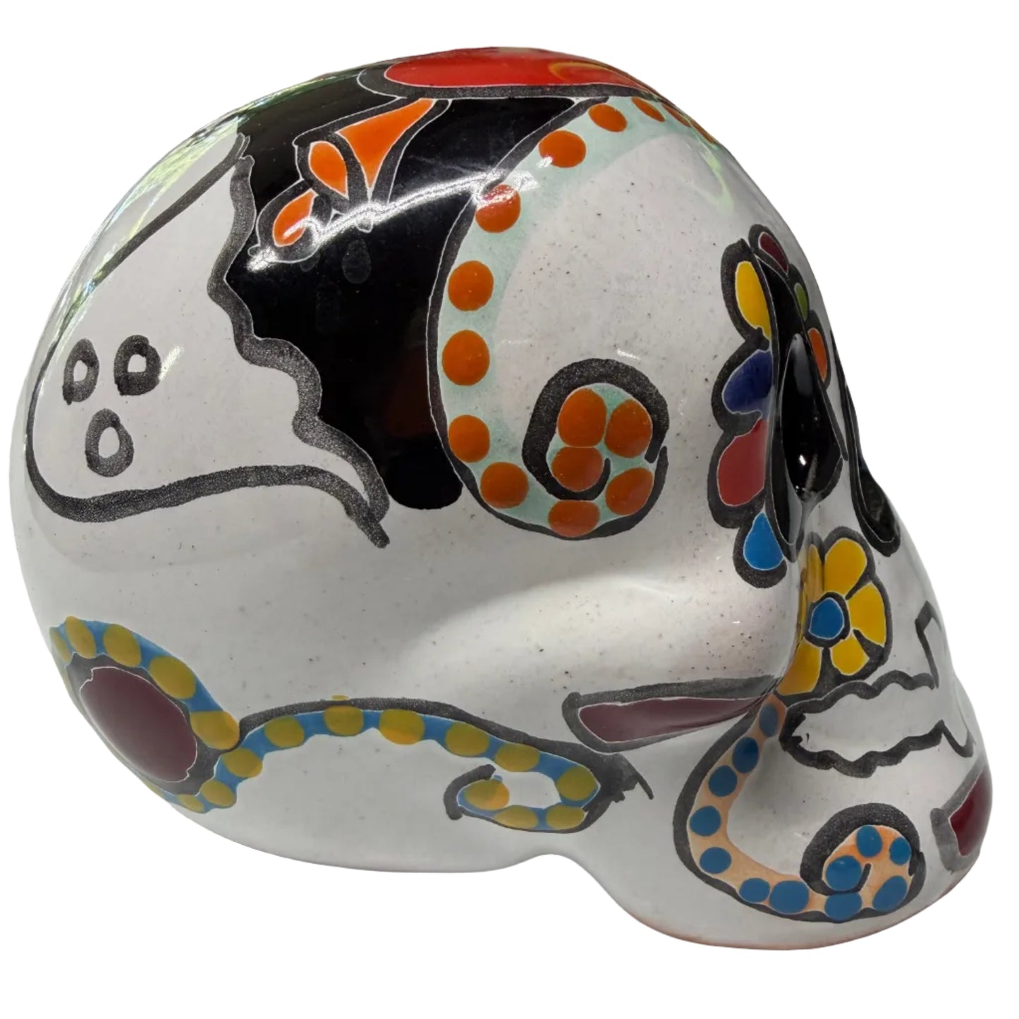 Decorative ceramic item with colorful patterns on a white surface