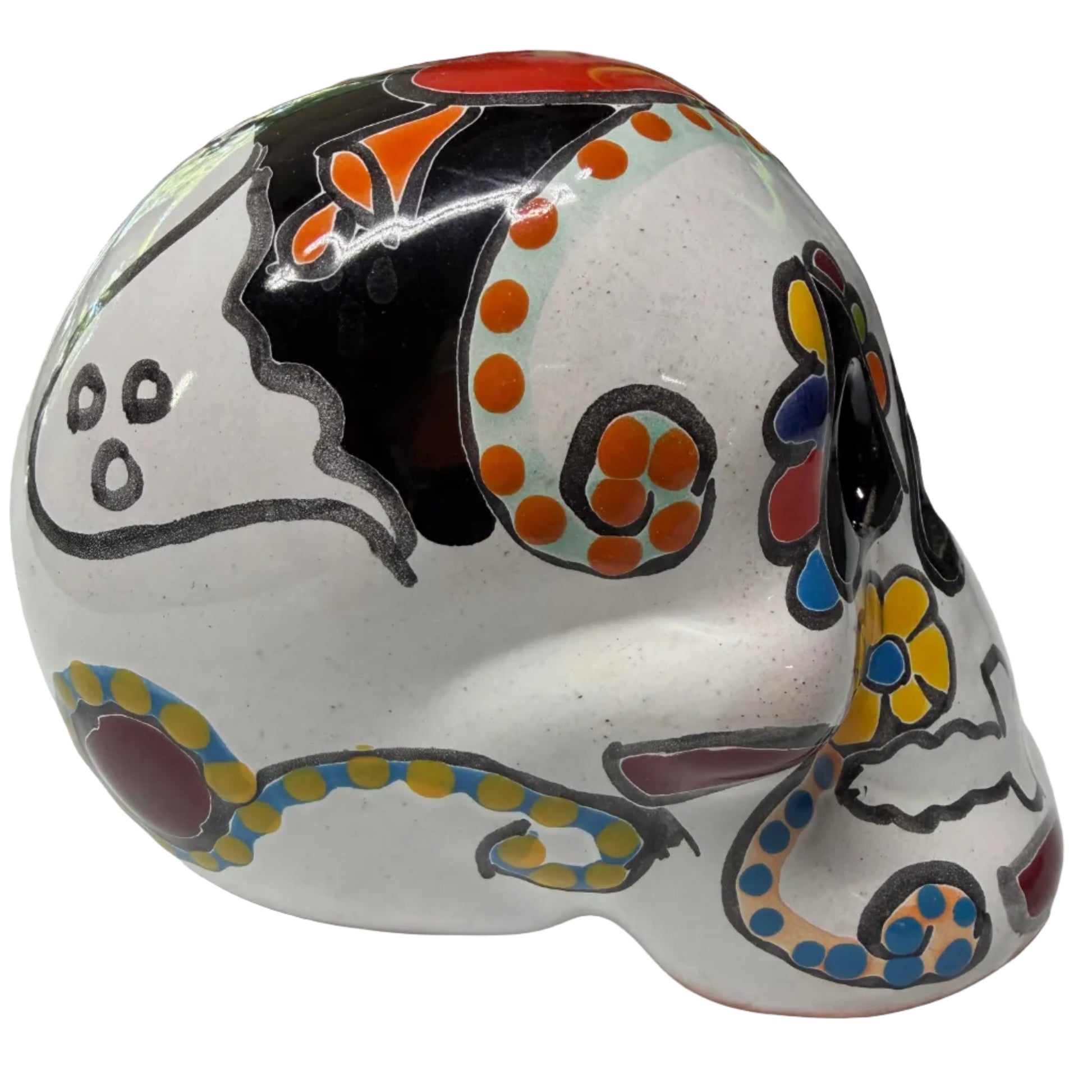 Decorative ceramic item with colorful patterns on a white surface